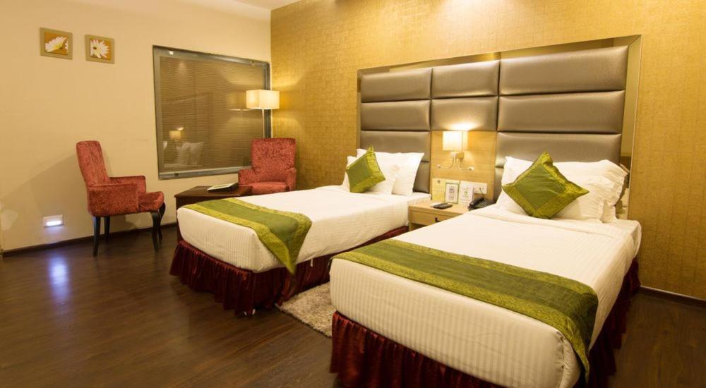 Hotel Kc Manor à Jamshedpur Extérieur photo