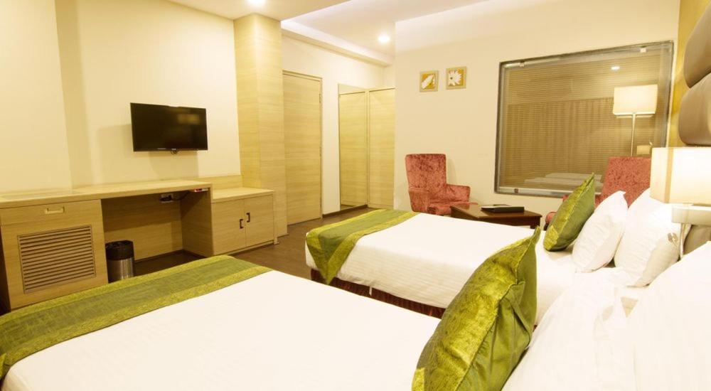 Hotel Kc Manor à Jamshedpur Extérieur photo